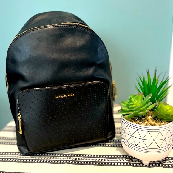 Michael Kors Handbags - Michael Kors Black medium backpack gold hardware